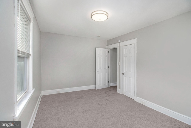 interior space with light colored carpet