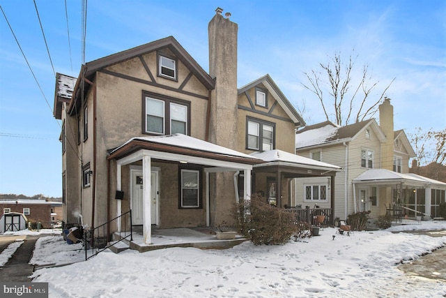 view of front of property featuring covered porch