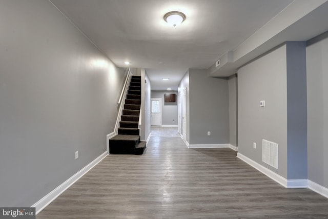 basement featuring hardwood / wood-style flooring