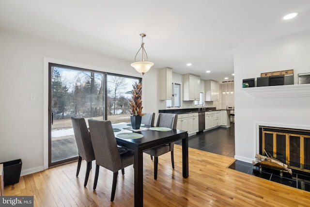 dining space featuring dark hardwood / wood-style floors