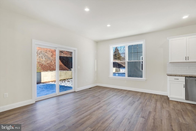 unfurnished living room with light hardwood / wood-style flooring