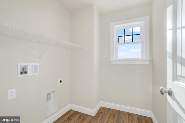 laundry area featuring hardwood / wood-style floors, hookup for a washing machine, and hookup for an electric dryer