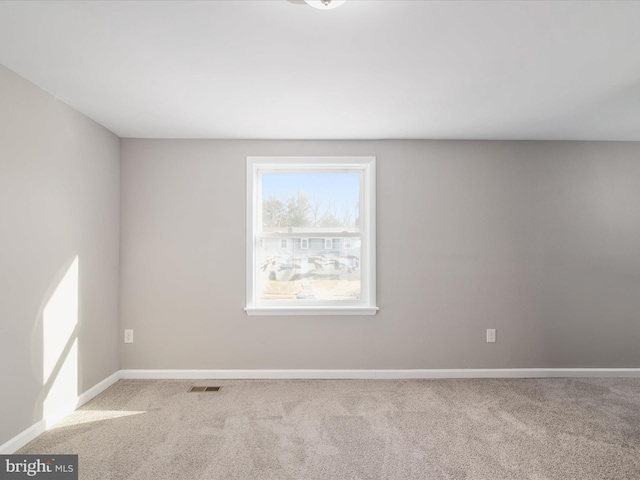 spare room with carpet flooring