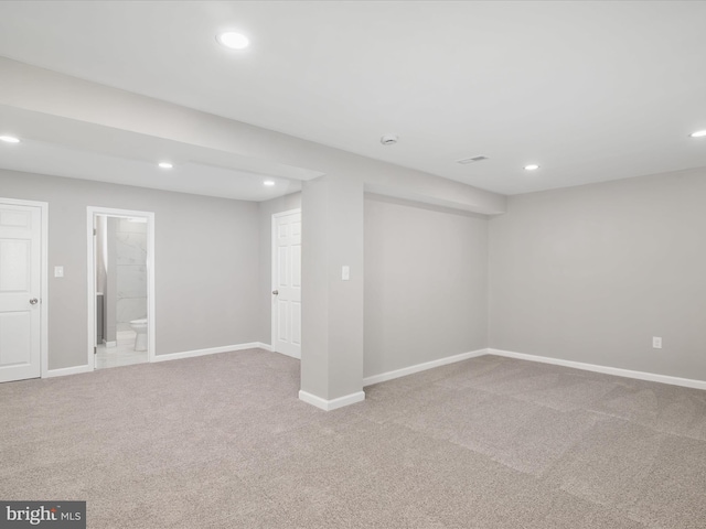 basement with carpet flooring