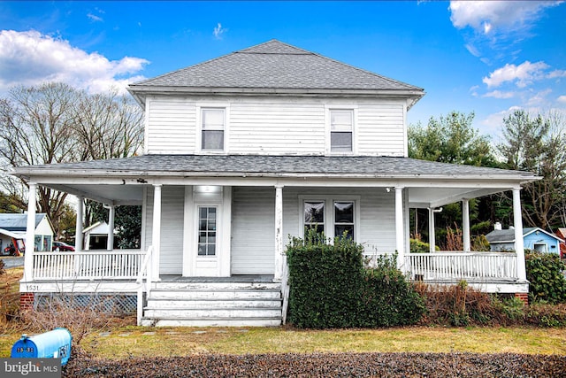 farmhouse inspired home with covered porch