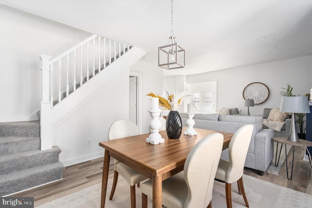 dining area featuring hardwood / wood-style flooring