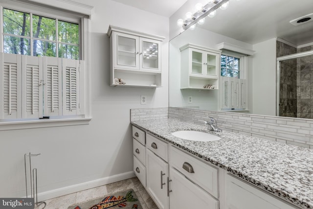 1000 Upper Glencoe Rd, Sparks Glencoe, MD 21152 - full bathroom with backsplash, baseboards, plenty of natural light, and a tile shower