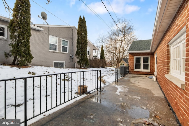 view of snow covered patio