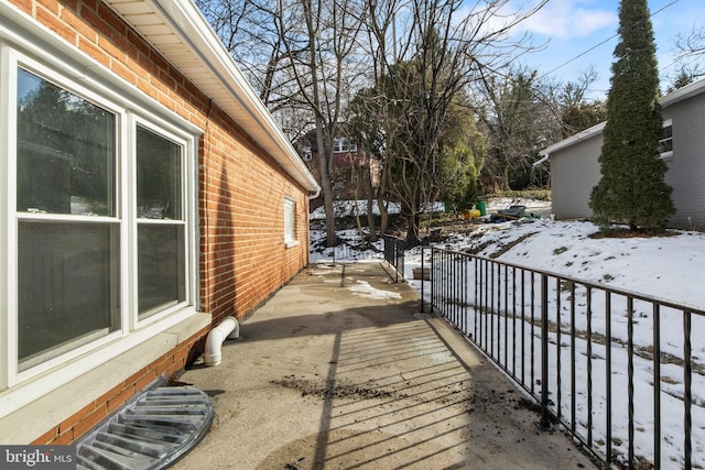 view of snow covered property