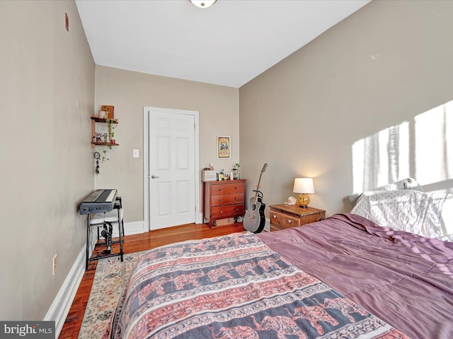 bedroom featuring hardwood / wood-style flooring