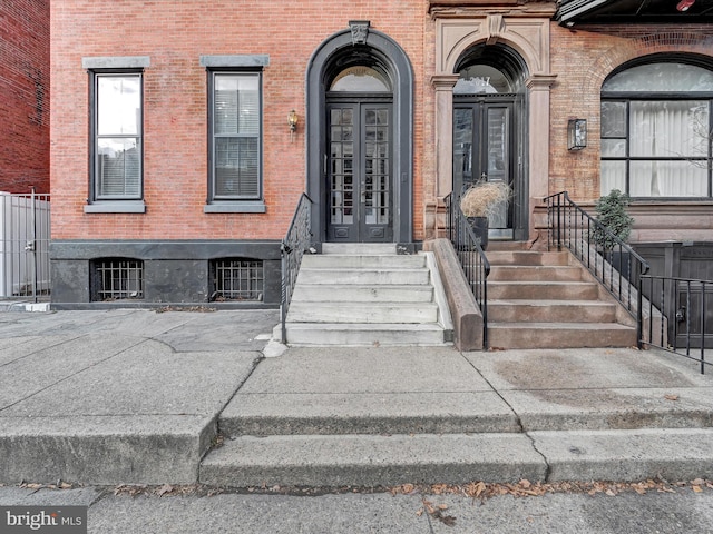 entrance to property featuring french doors