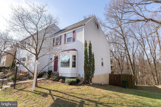 view of front of property with a front lawn