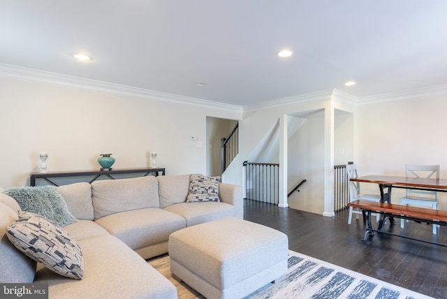 living room with crown molding, recessed lighting, and wood finished floors