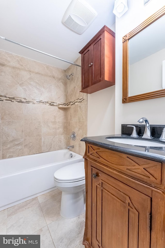 bathroom featuring vanity, visible vents, shower / tub combination, toilet, and tile patterned floors