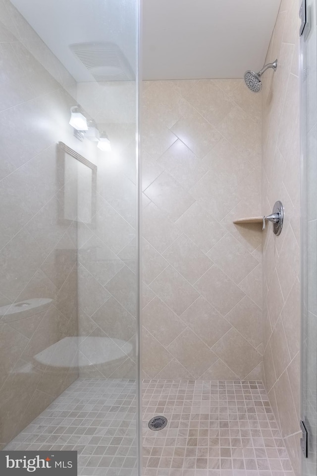 bathroom featuring a stall shower