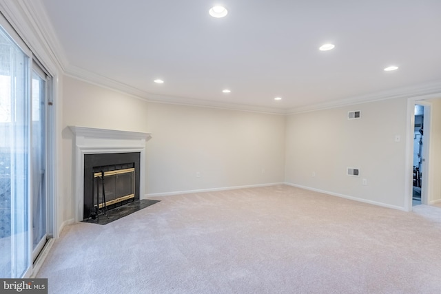 unfurnished living room with a fireplace with flush hearth, carpet, visible vents, and ornamental molding