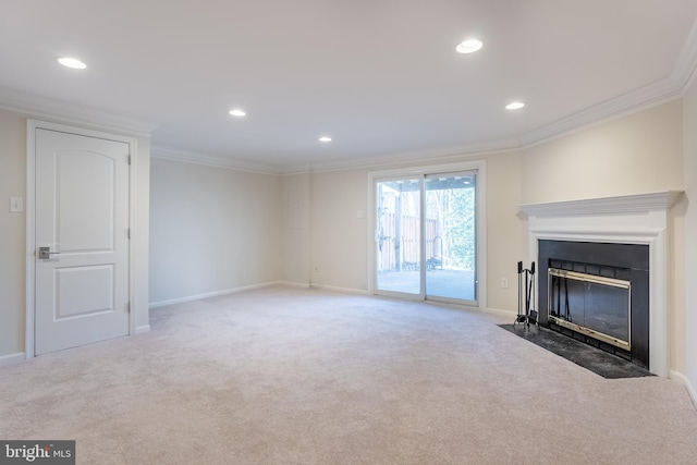 unfurnished living room with crown molding, baseboards, a fireplace with flush hearth, carpet floors, and recessed lighting