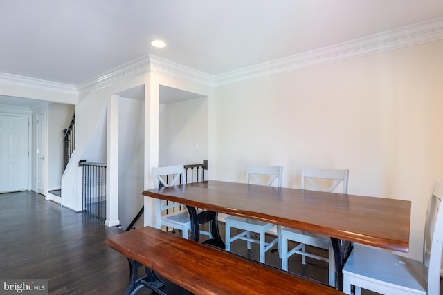 dining space featuring recessed lighting, crown molding, stairs, and wood finished floors