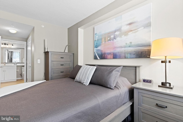 bedroom featuring a textured ceiling