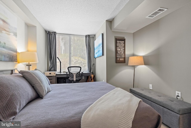 bedroom with a textured ceiling