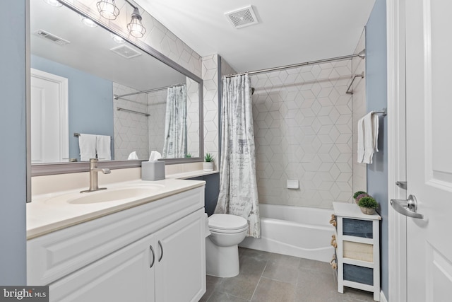 full bathroom featuring shower / tub combo with curtain, vanity, toilet, and tile patterned flooring