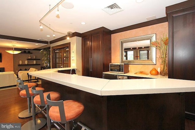 bar featuring dark hardwood / wood-style floors