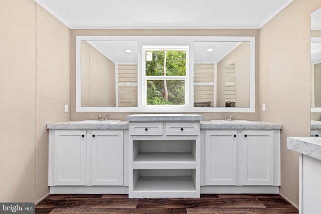 bathroom featuring vanity and hardwood / wood-style flooring