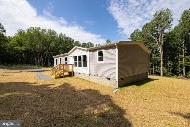 exterior space with a yard