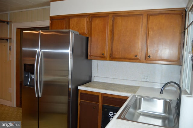 kitchen featuring sink and stainless steel fridge