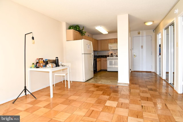 kitchen featuring white appliances