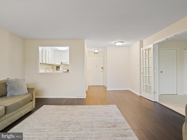 living room with hardwood / wood-style floors