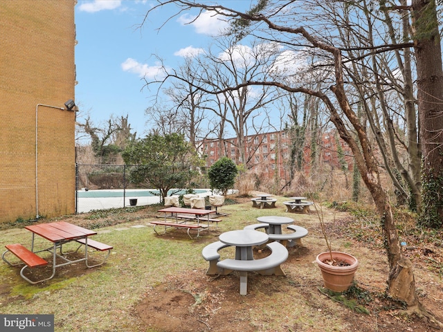 view of yard featuring a swimming pool