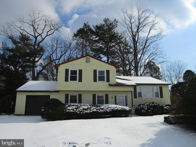 tri-level home featuring a garage