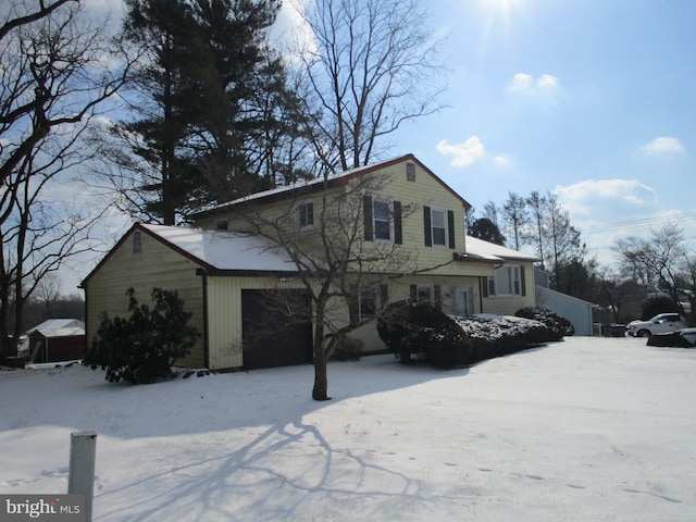 view of front of property featuring a garage