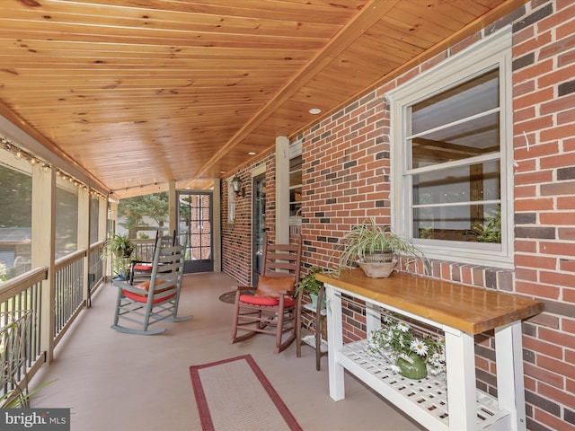 sunroom with wood ceiling