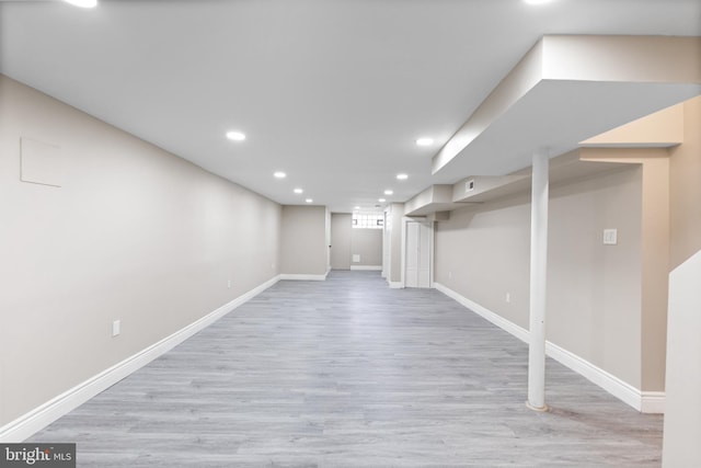 basement with light wood-type flooring