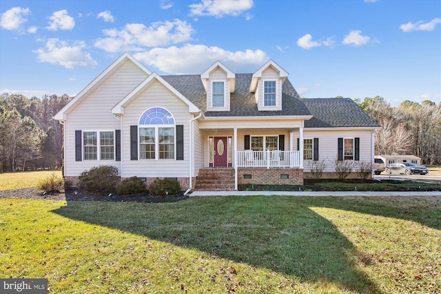 cape cod-style house with a front lawn and a porch