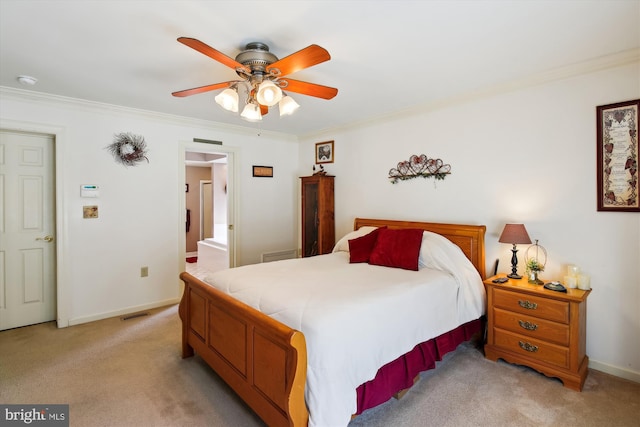 bedroom with crown molding, light colored carpet, and ceiling fan