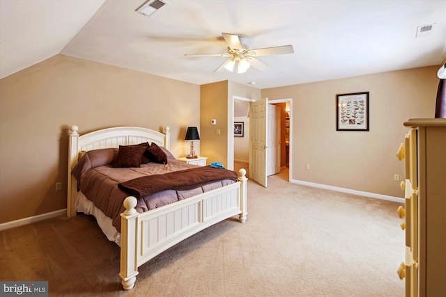 carpeted bedroom with lofted ceiling and ceiling fan