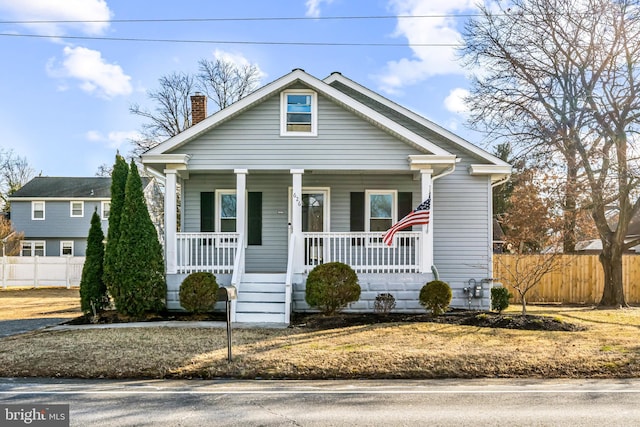 bungalow-style home featuring covered porch