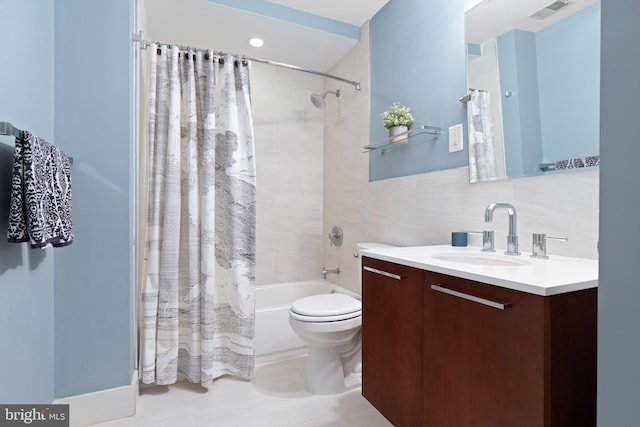 full bathroom with toilet, tile walls, vanity, shower / bathtub combination with curtain, and backsplash