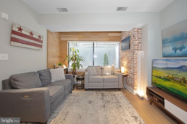 living room with light hardwood / wood-style floors