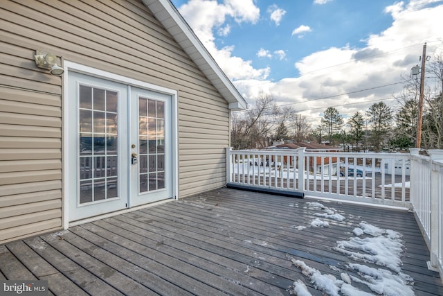 wooden terrace featuring french doors