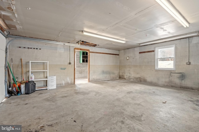 garage featuring concrete block wall