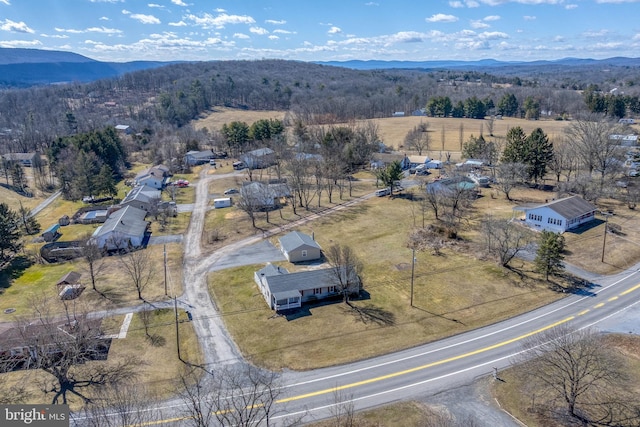 drone / aerial view with a mountain view and a rural view