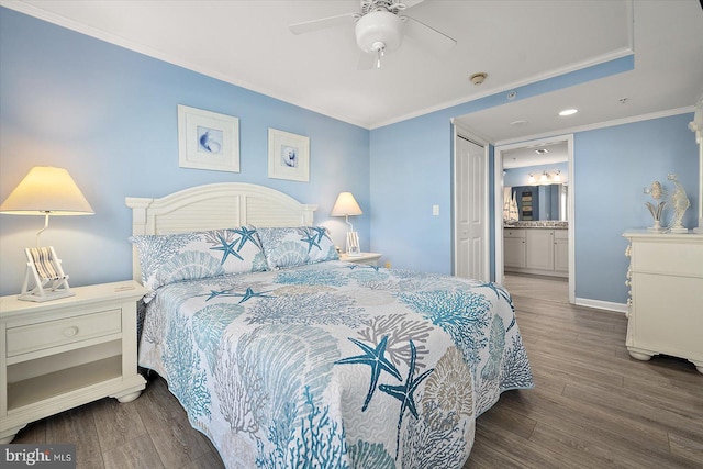 bedroom featuring wood-type flooring, ornamental molding, connected bathroom, and ceiling fan