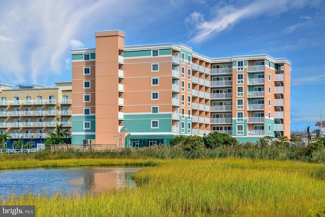 view of building exterior featuring a water view