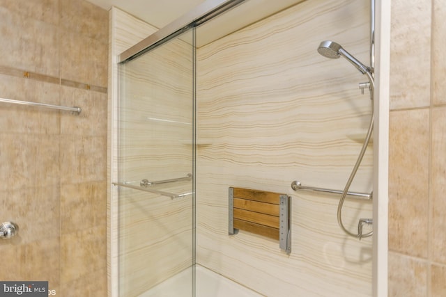 bathroom featuring an enclosed shower