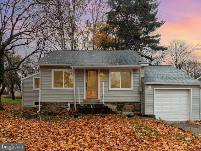 view of front of home featuring a garage