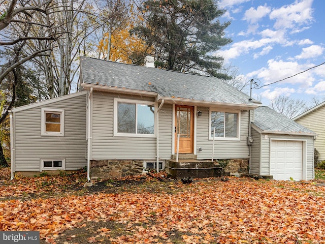 view of front of property featuring a garage